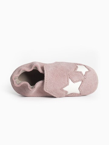 Bottes 'Star infant' Minnetonka en rose