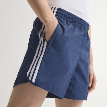 ADIDAS ORIGINALS Szabványos Nadrág 'Sprinter' - kék