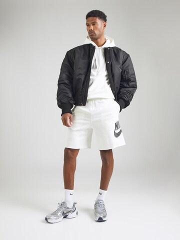 Loosefit Pantaloni 'CLUB ALUMNI' di Nike Sportswear in beige