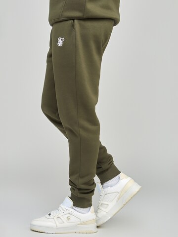 SikSilk Flared Sporthose in Grün