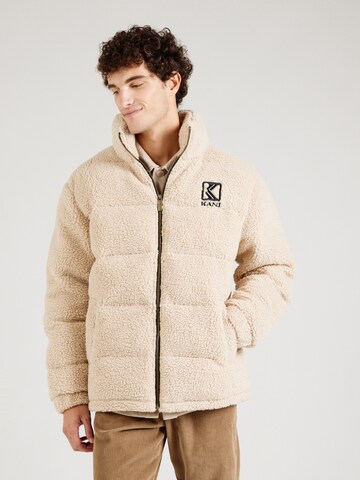 Giacca invernale di Karl Kani in beige: frontale