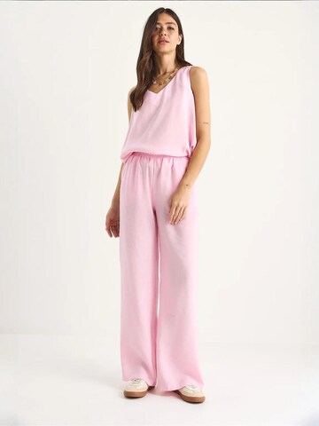 Completo pantalone di Bianco Lucci in rosa
