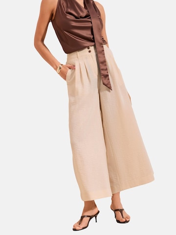 Wide leg Pantaloni con pieghe di Friends Like These in beige: frontale
