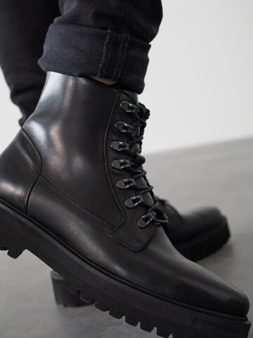 Bottines à lacets 'Alen' DAN FOX APPAREL en noir