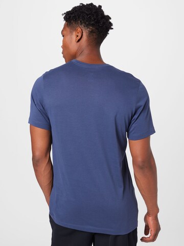 NIKE - Camisa funcionais 'Heritage' em azul