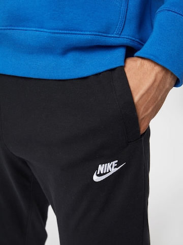 Nike Sportswear Дънки Tapered Leg Панталон в черно