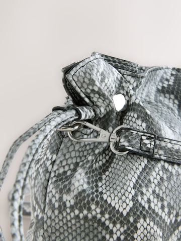 Next Clutch in Grey