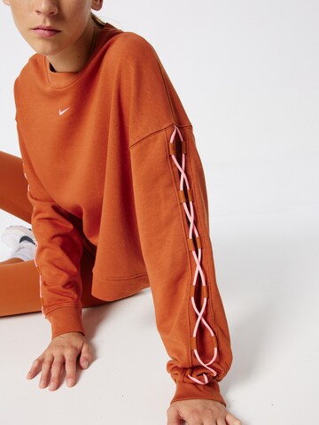 oranžinė NIKE Sportinio tipo megztinis