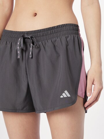 regular Pantaloni sportivi 'Run It' di ADIDAS PERFORMANCE in grigio