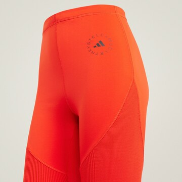 ADIDAS BY STELLA MCCARTNEY Flared Sportsbukser 'TrueStrength' i rød