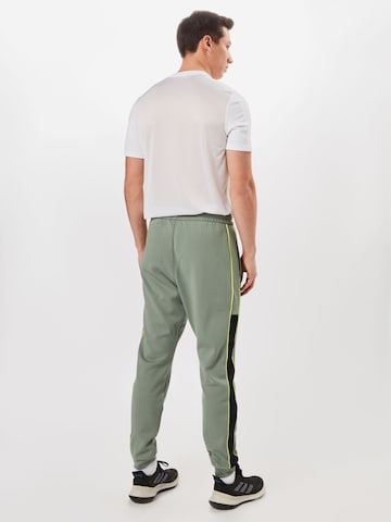 Reebok Tapered Workout Pants 'WORKOUT READY' in Green