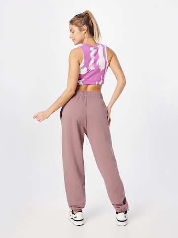 Tapered Pantaloni 'Adicolor Essentials Fleece' di ADIDAS ORIGINALS in rosa