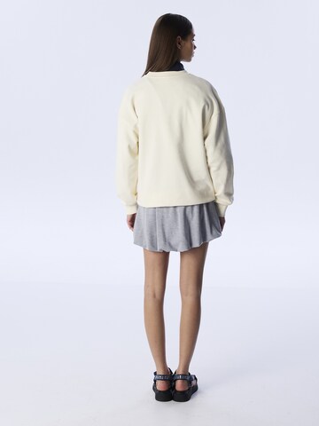 Sweat-shirt Twist en beige