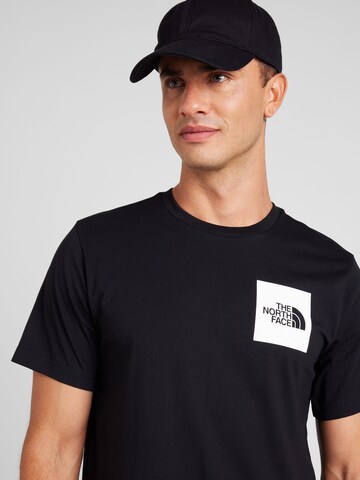 THE NORTH FACE T-shirt i svart