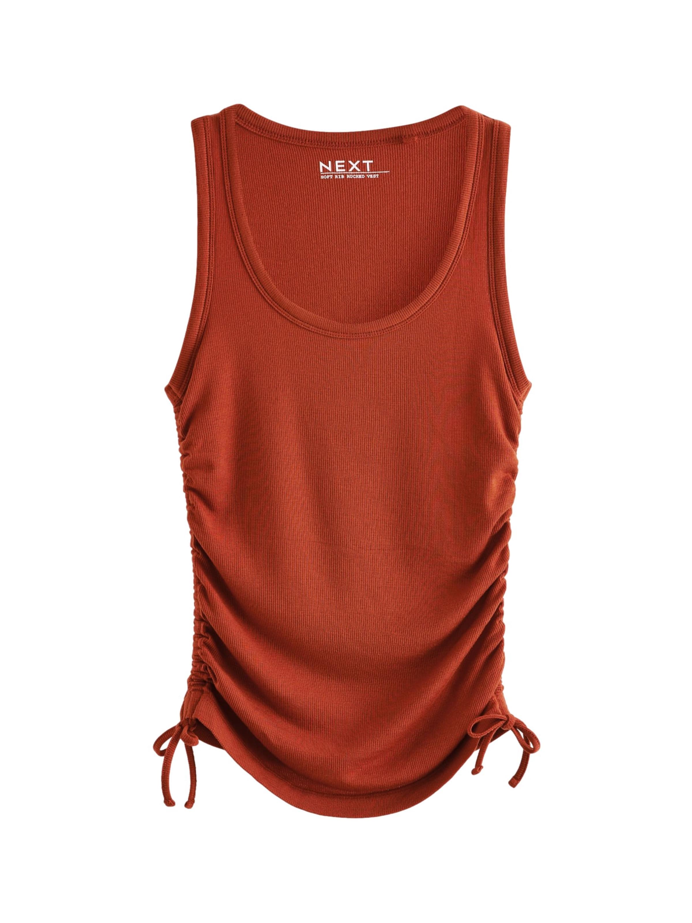 Next - Top en rojo: frente