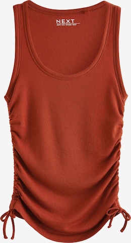 sarkans Next Topiņš: no priekšpuses