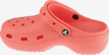 Crocs Clogs in Pink: front