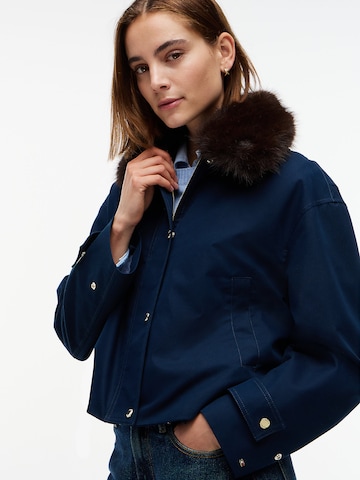 TOMMY HILFIGER Tussenjas in Blauw