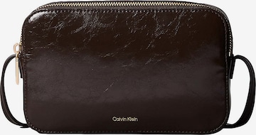 Calvin Klein Crossbody Bag in Brown: front