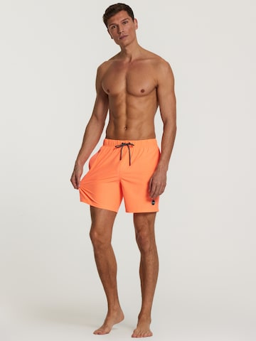 Shiwi Kratke kopalne hlače 'easy mike solid 4-way stretch' | oranžna barva