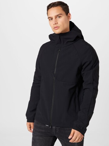 Krakatau Between-Season Jacket in Black: front