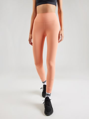 NIKE Skinny Fit Спортен панталон 'ONE' в оранжево: отпред