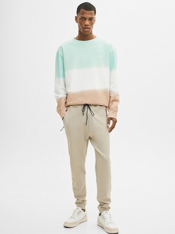 Pull&Bear Tapered Trousers in Beige: front