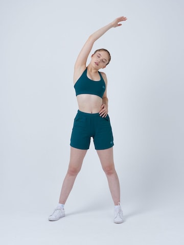 SPORTKIND Loosefit Sportbroek 'Bermuda Shorts' in Groen