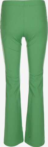 Evazați Leggings 'Badge' de la Tommy Jeans pe verde