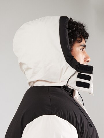 JACK & JONES Kurtka zimowa 'COURBAN PUFFER' w kolorze beżowy