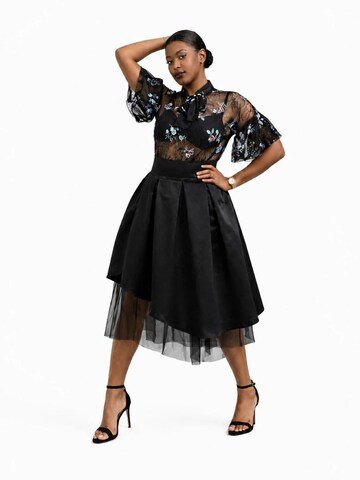 BIBI SAKALIEVA Rok 'Black Pleated Midi Skirt with Asymmetric Hem and Tulle' in Zwart