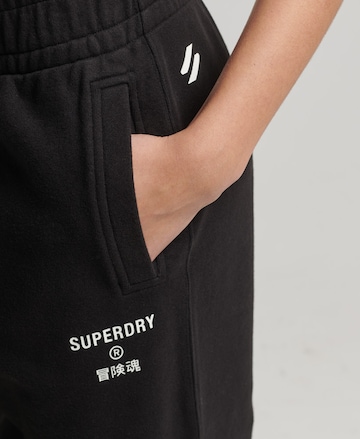 Superdry Ozke Hlače | črna barva