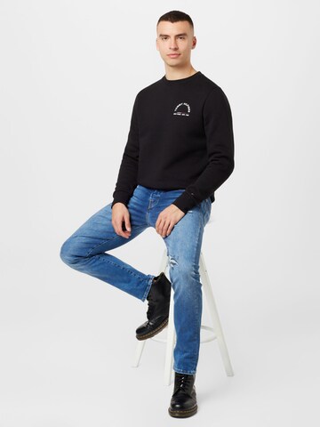 TOMMY HILFIGER Collegepaita värissä musta