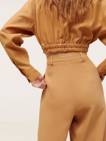 Kendall for ABOUT YOU Loose fit Pleat-Front Pants 'Ruby' in Brown