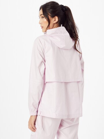 Nike Sportswear - Chaqueta de entretiempo en rosa