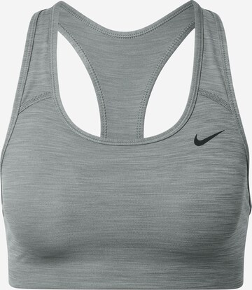 Reggiseno sportivo di NIKE in grigio: frontale