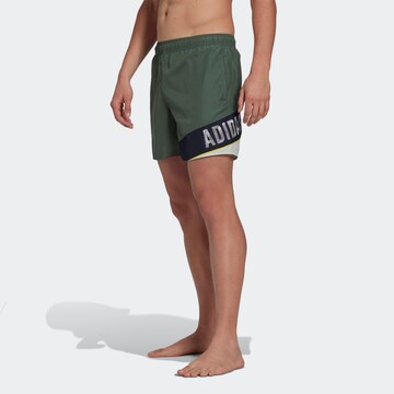 ADIDAS PERFORMANCE Swimming Trunks in Green: front