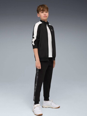regular Pantaloni sportivi 'Puma Ess Camo Sweatpants' di PUMA in nero