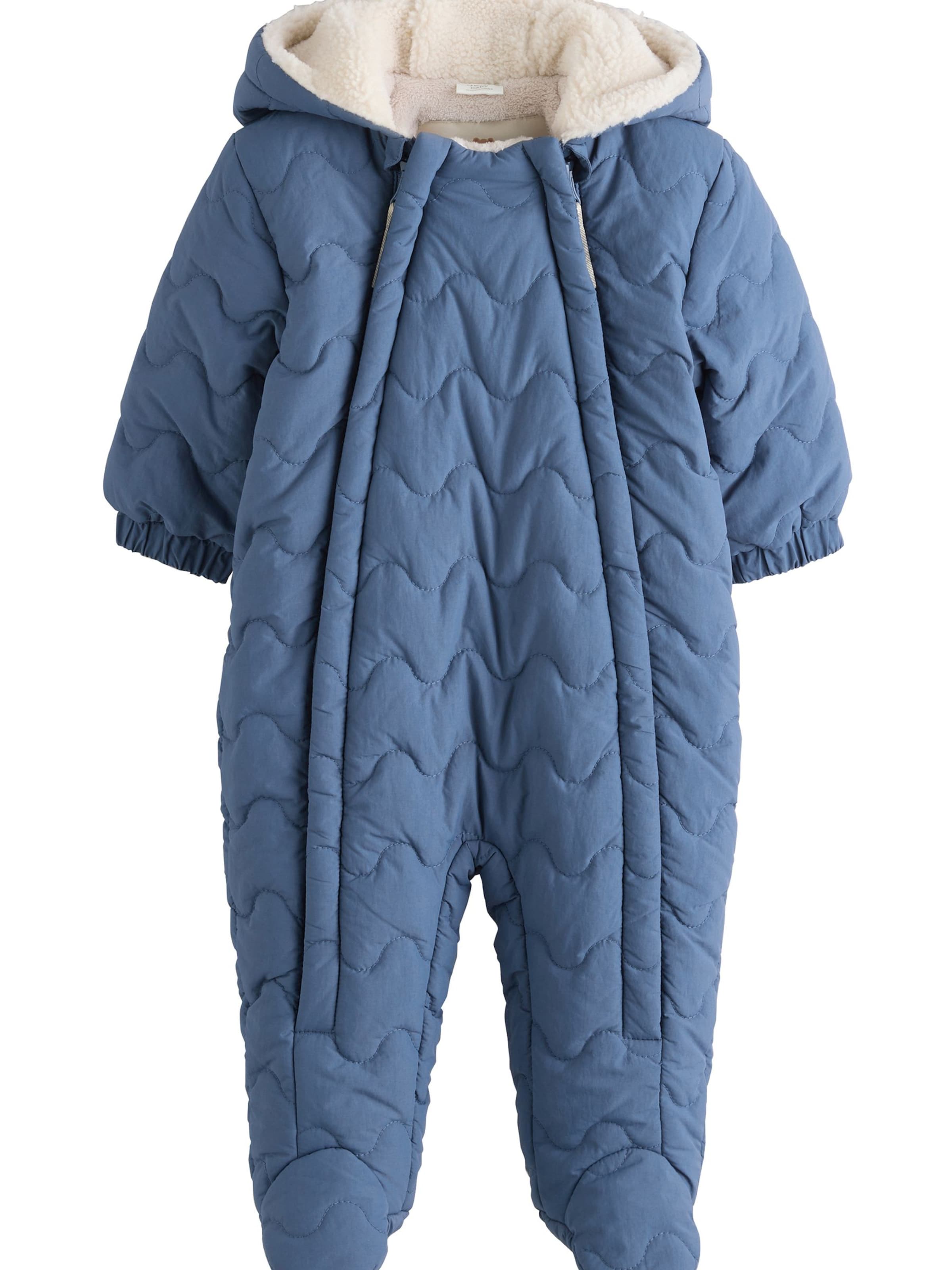 Next Overall i blå: framsida