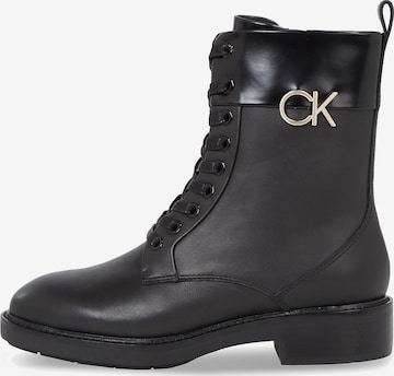 Calvin Klein Lace-Up Ankle Boots in Black: front