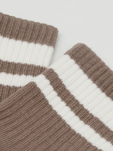 CALZEDONIA Socks in Brown