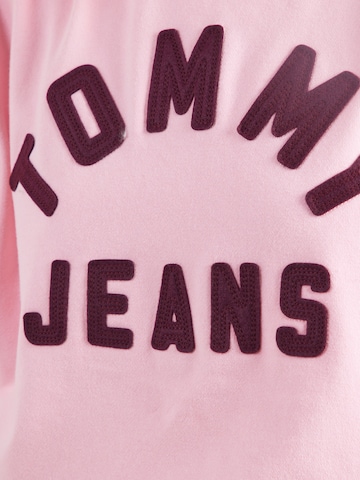 rožinė Tommy Jeans Megztinis be užsegimo 'ARCH'