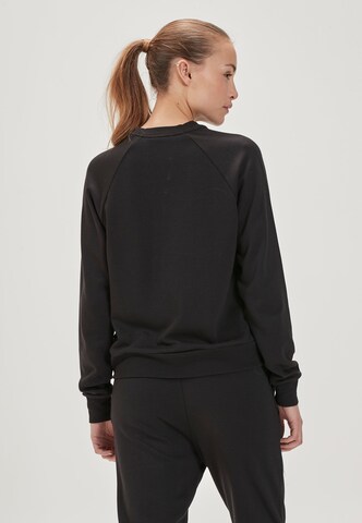 Athlecia Sportsweatshirt 'NIARY' in Schwarz