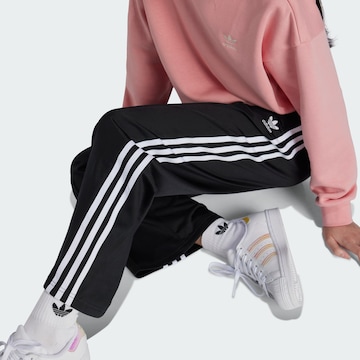 Wide leg Pantaloni 'Adicolor' di ADIDAS ORIGINALS in nero