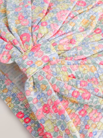 Căciulă de la Next pe galben