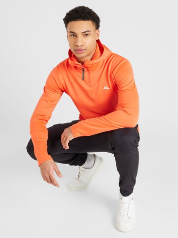 J.Lindeberg - Sweatshirt de desporto 'Aerial' em laranja