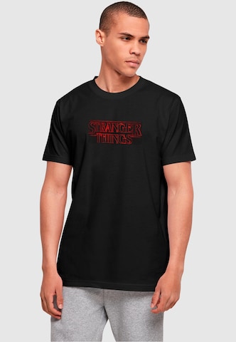 ABSOLUTE CULT Shirt 'Stranger Things - Glow' in Black: front