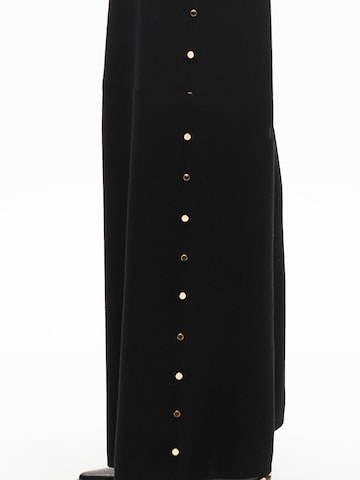 Wide leg Pantaloni di Lola Casademunt in nero