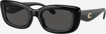 Lunettes de soleil COACH en noir : devant