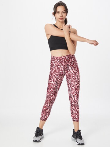 Skinny Pantalon de sport UNDER ARMOUR en rouge